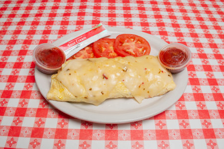 Delicious American cuisine known as Trple Meat Omeletteの写真素材