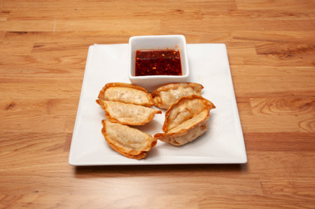 Traditional and authentic delicious Chinese cuisine known as fried dumplingsの写真素材