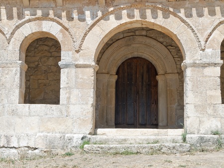 Mozarabic chapel with Romanesque portico of St. Cecilia in santibañez of val in the province of Burgos, Spain の写真素材