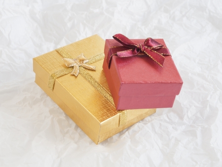 red gift box on abstract white backgroundの写真素材