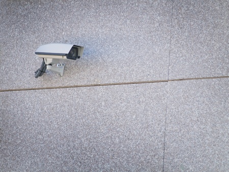 security cameras attached on the office building corner の写真素材