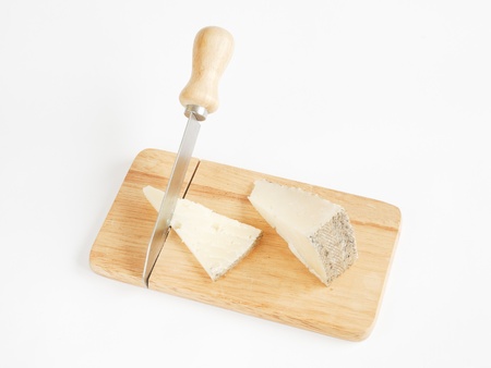 sheep cheese with knife on wood, typical of Spain produdtoの写真素材