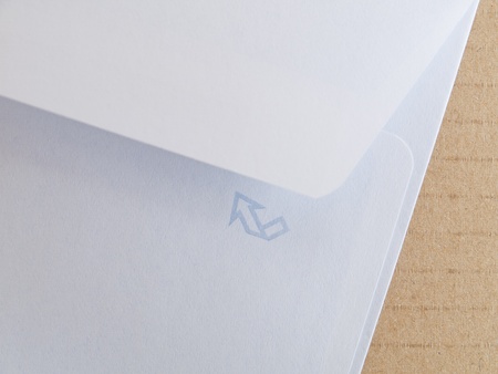 white envelope on cardboard background