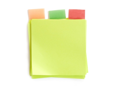 sheets of green paper with colored markers