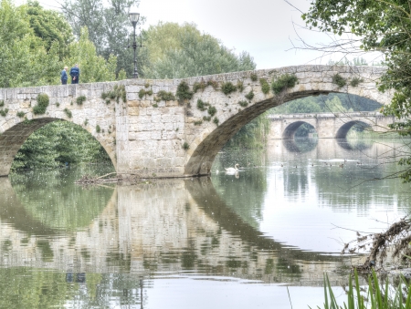 medieval bridge over the river Carrion in Palencia, Spain の写真素材