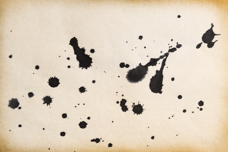 old paper background with ink spots の写真素材
