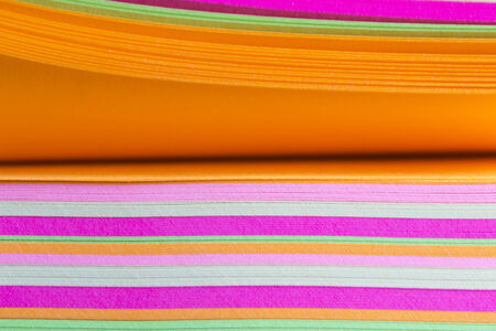 abstract colored cardboard stacked with texturesの写真素材