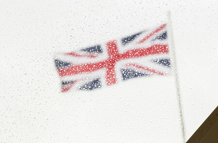 england flag through wet glass