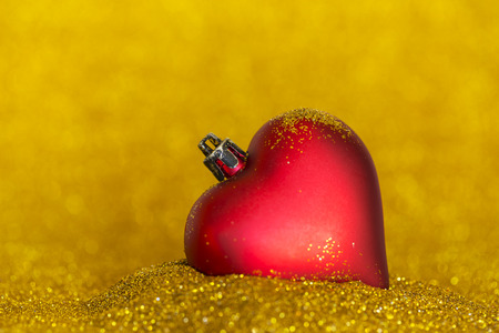 christmas decoration with heart shape and gold background and focusの写真素材