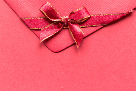 Red paper envelope with bowの写真素材