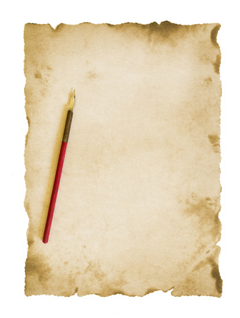 ink pen and aged paper parchmentの写真素材