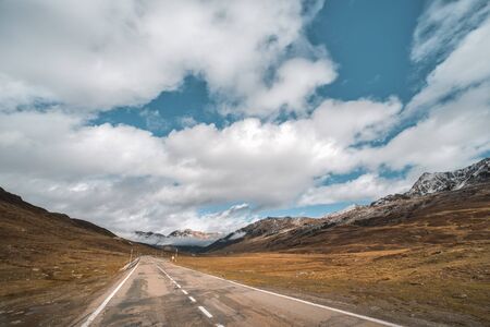the road that leads to the snowy mountains of Baqueira, Catalan Pyrenees.の写真素材