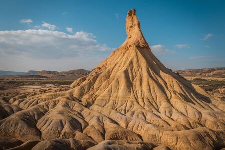 Characteristics forms created by the erosion of the water an wind in the Bardenas Reales desert, Navarra, Spainの写真素材