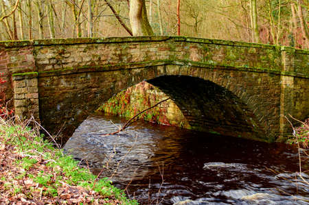 Old buildings by the stream