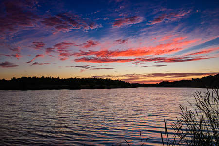 Beautiful sunset on the lake.の写真素材