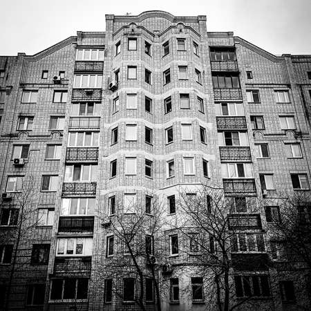 Black and white photo of a modern apartment building in Moscow, Russia