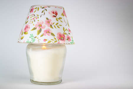 lamp with candle isolated on white backgroundの写真素材