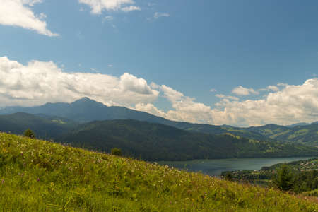 The mountain and the lake. Romania, Mount Ceahlau and the lake Izvorul Munteluiの写真素材