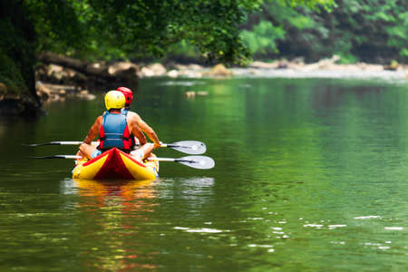 kayak on the river. Rafting on the river Crisul Repede, Bihor, Romaniaの写真素材