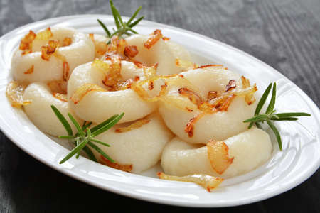 Silesian dumplings with fried onionの写真素材