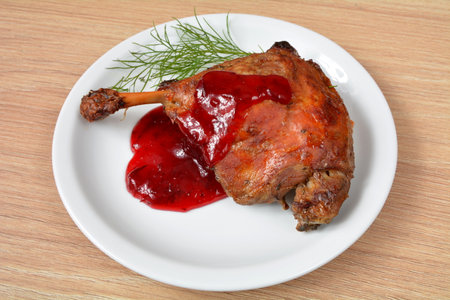 duck leg with cranberry sauceの写真素材