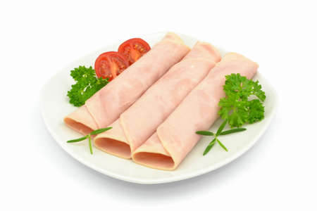 slices of ham on a white backgroundの写真素材
