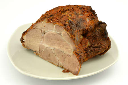 roast pork on a plateの写真素材