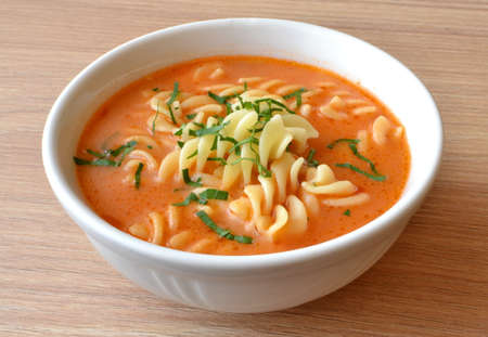 tomato soup with noodlesの写真素材