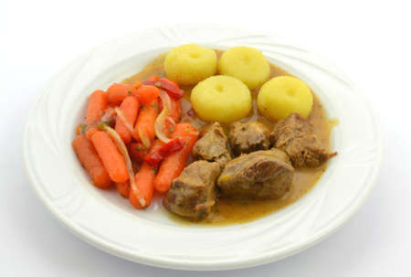 Silesian dumplings with goulash sauceの写真素材