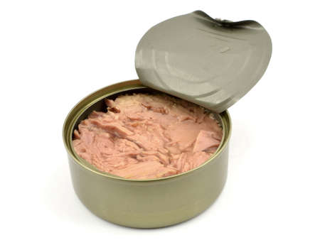 tuna pieces in a can on a white backgroundの写真素材