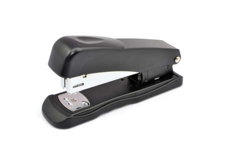 an office stapler on a white background
