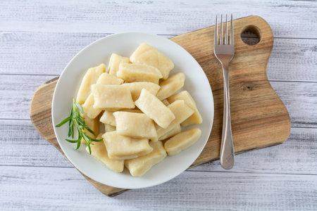 homemade potato dumplings on a plateの写真素材