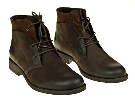 Pair of brown leather boots isolated on white の写真素材