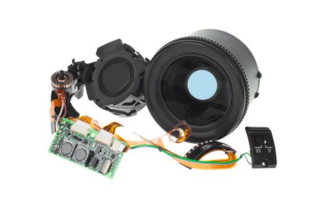 Camera lens has been dropped and shattered on white background.の写真素材
