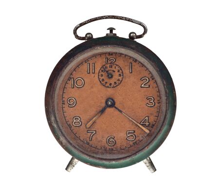An old rusty alarm-clock with its handmade face.の写真素材