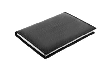 Black notebook  over a white background.の写真素材