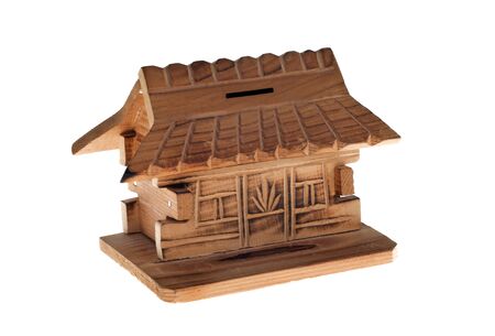 A small wooden house,money box. 
の写真素材