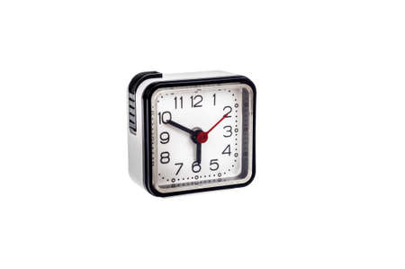 Front view of an old  alarm clock on white background