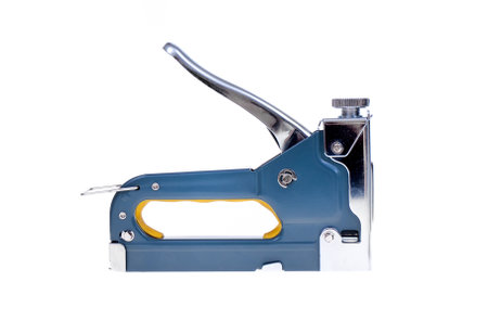 Industrial stapler for driving staples on a white background.の写真素材