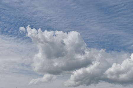 Cumulus cloud is appearing in the blue sky over Liechtenstein 3.5.2020