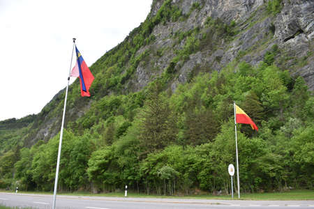 Liechtenstein national flag is waving at the border to Switzerland 30.4.2020のeditorial素材