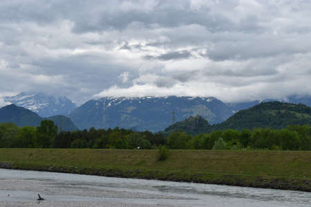 View over the rhine river at the border between Switzerland and Liechtenstein 30.4.2020の写真素材