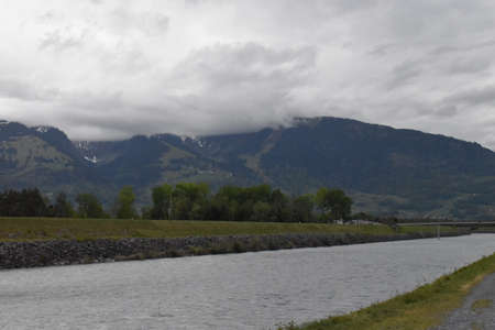 View over the rhine river at the border between Switzerland and Liechtenstein 30.4.2020の写真素材