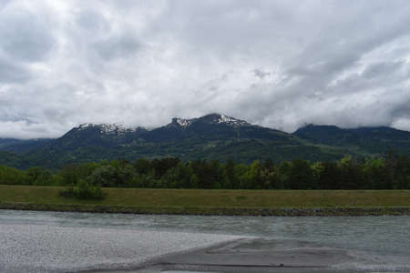 View over the rhine river at the border between Switzerland and Liechtenstein 30.4.2020の写真素材