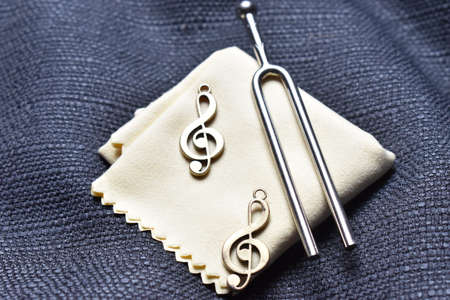 Presentation of a tuning fork and clef for music artists 12.5.2020の写真素材