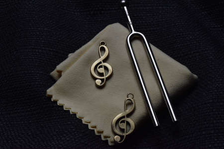 Presentation of a tuning fork and clef for music artists 12.5.2020の写真素材