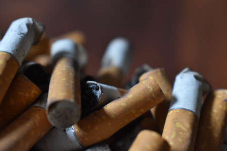 Ashtray overloaded with used cigarettes 12.5.2020の写真素材