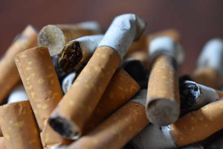 Ashtray overloaded with used cigarettes 12.5.2020の写真素材