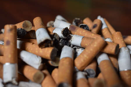 Ashtray overloaded with used cigarettes 12.5.2020の写真素材