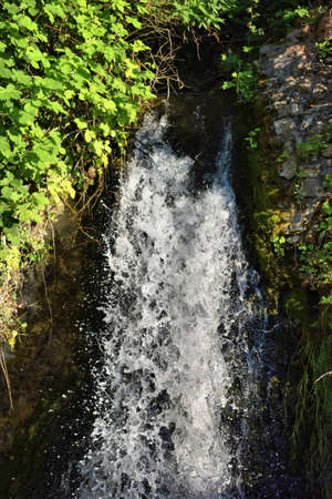 Splashing tiny waterfall at the rhine falls in Switzerland 20.5.2020の写真素材
